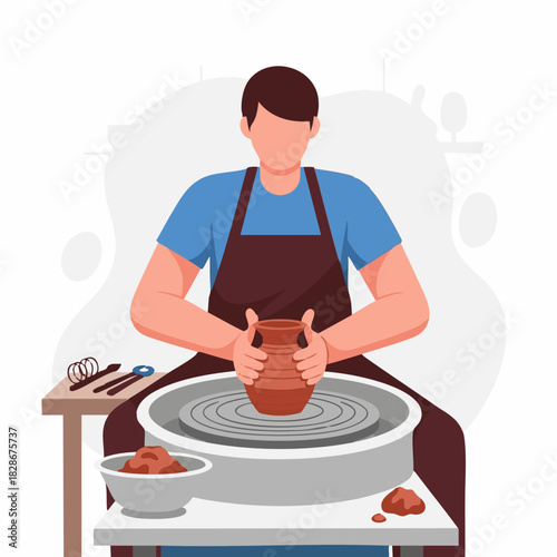 male artisan crafting clay on pottery wheel