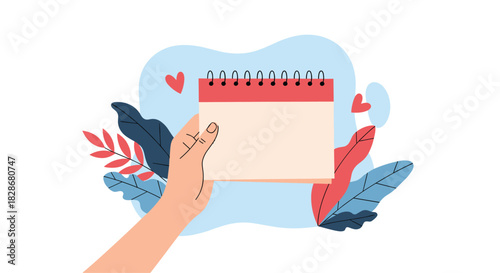 A hand holding a blank spiral notebook or calendar surrounded by colorful leaves and hearts on an abstract background illustration.