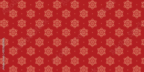 Elegant seamless pattern with golden snowflakes and tiny stars on a rich red background, perfect for Christmas wrapping paper, festive textiles, greeting cards, invitations and seasonal holiday design