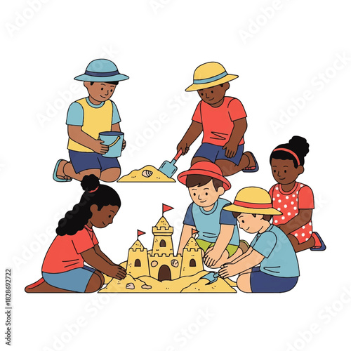 Children playing together on the beach building a colorful sandcastle at the seaside.