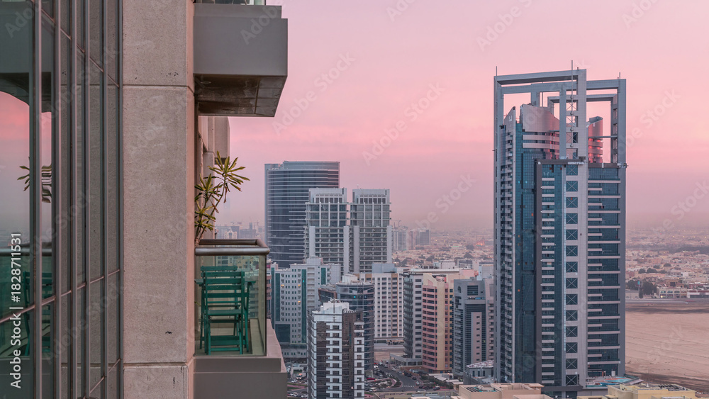 Obraz premium Greens district aerial view from top night to day timelapse.