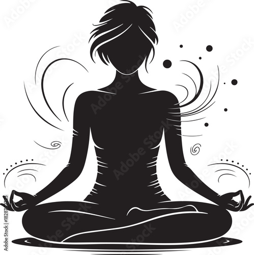 Silhouette of woman meditating in lotus position for inner peace