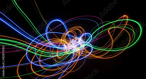 Vibrant and chaotic streams of colorful light trails swirling in a dynamic abstract pattern against a dark background
