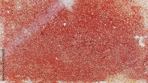 Close up view of a red and white textured abstract surface