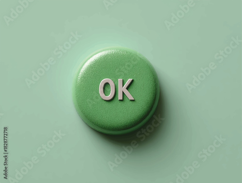 Green round button with OK inscription conveying acceptance or approval message
