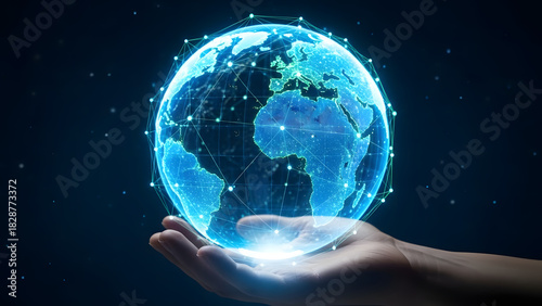 Human hand holding a glowing digital earth globe