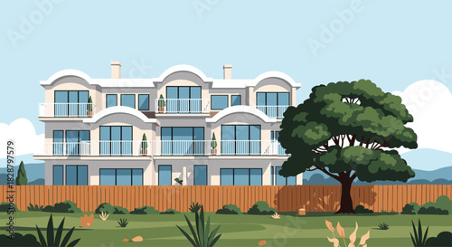 Modern residential building with multiple balconies and large windows overlooking a spacious green garden with a tall tree and a wooden fence.