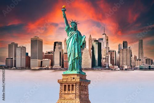 New York City downtown skyline panoramic sunset view with Lady Liberty statue