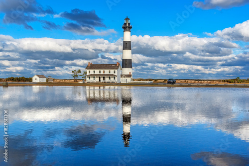 Slika na platnu Bodie Island Lighthouse reflects in a pool in the Outer Banks of North Carolina