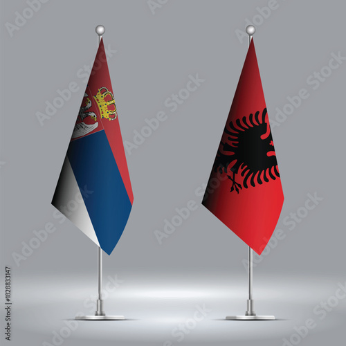 Two Standing Flags Representing Albania vs Serbia with Flags on Bodies 