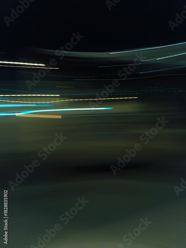 Selective focus photography. A frame in motion. Abstract background. Colorful image. Long shutter speed. Light streaks. Movement of transportation. Shooting from transportation. Blurred image.