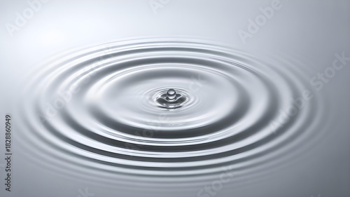 clean, white background with a 3D water ripple effect in the corner.