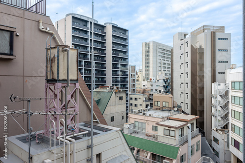 都心のビル街風景・雑居ビルと高層マンション
