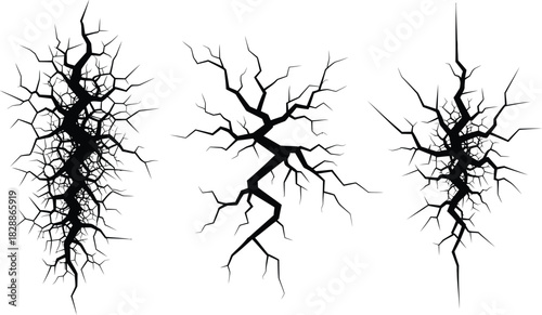 Collection of detailed black crack patterns and damage effects for various graphic design projects, perfect for representing stress, destruction, impact, or grunge aesthetics on surfaces
