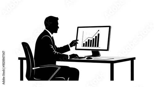 Businessman analyzing growth chart on computer screen at desk