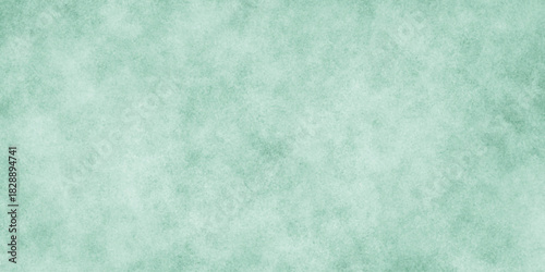 Abstract green paper texture and green watercolor painting background. stone marble wall concrete texture dark concept in backdrop. texture of colored parchment paper.