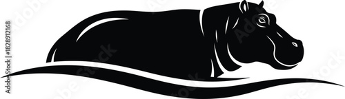 Silhouette of a hippopotamus partially submerged