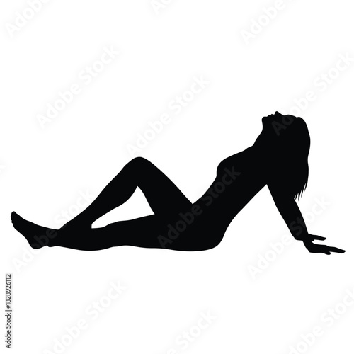 Silhouette of a woman reclining in a relaxed suggestive pose