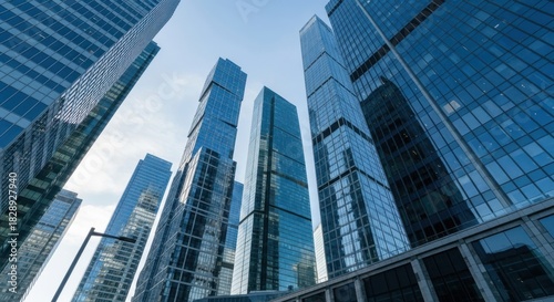 Wallpaper Mural Skyscrapers reach for the sky in a modern urban landscape, reflecting light Torontodigital.ca
