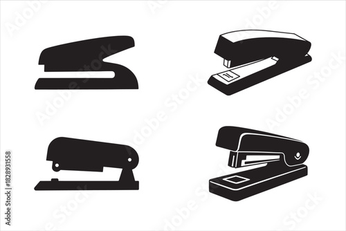 Four black silhouette staplers on a white background isolated