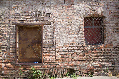 Wallpaper Mural Brick wall of an old house, a window with bars and a rusty door. Torontodigital.ca