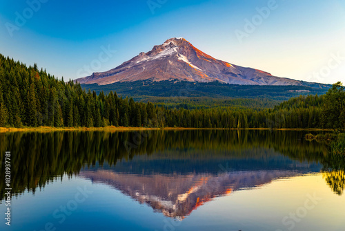 Scenic view of Mount Hood reflecting in Trillium Lake at vivid sunrise