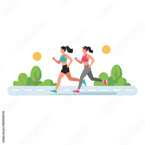 Two women jogging on a tree lined pathway with lush green bushes and yellow sun in the background with a paved road and a curb and a clear sky