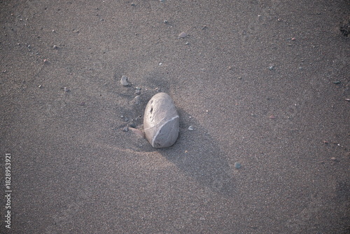 Beautiful stones, pebbles and sand in the shallows.