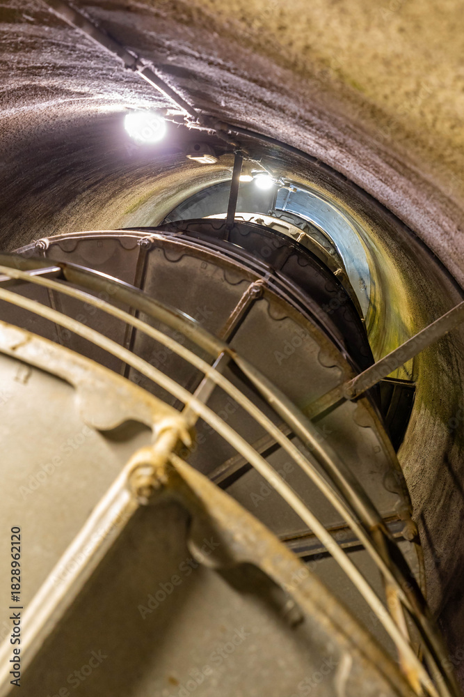 Fototapeta premium A Dramatic Interior View of the Swirling Ladder in Astoria Column