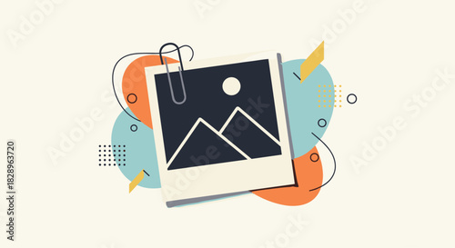 A modern and abstract composition with a blank instant photo frame held by a paperclip for your image or message.