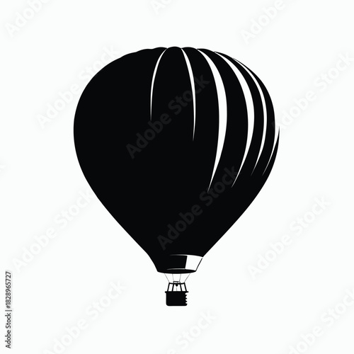 Black silhouette of a hot air balloon with a basket airship flight
