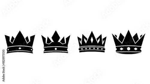 Vector illustration of set of four black silhouette royal crown icons isolated on transparent background