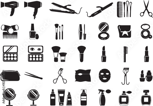 Variety of cosmetic beauty tools and accessories arranged in monochrome design