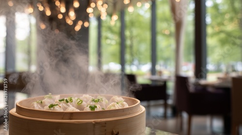 A dynamic, eye-level photograph of a bamboo steamer basket filled with steaming dumplings