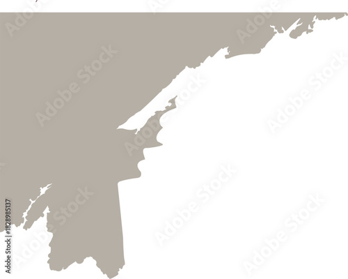 An abstract coastline-style silhouette featuring irregular jagged edges and organic contours, creating a bold contrast between a beige landmass and a deep black background.