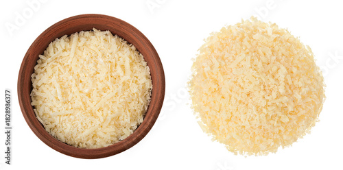 grated parmesan cheese in ceramic bowl and wooden spoon isolated on white background. Top view. Flat lay