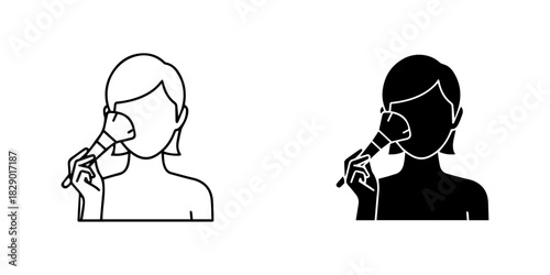 Woman applying makeup with a brush, depicted as an outline and silhouette icon, isolated on