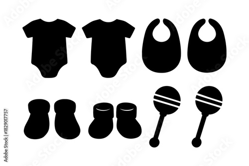 Black baby clothing and accessories set with onesies, bibs, booties, and rattles.