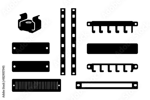 Collection of various metal straps and brackets for industrial use.