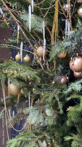 Christmas Tree With Golden Baubles And Winter Greenery Video
