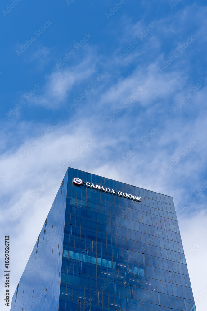Fototapeta premium Toronto, Canada - September 21, 2025: Canada Goose new Headquarters at 100 Queens Quay East in Toronto, Canada. Goose Holdings Inc is a Canadian company of luxury winter clothing manufacturers.