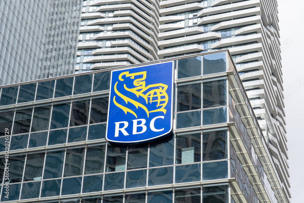 Fototapeta premium Toronto, Canada - September 21, 2025: Close up of RBC (Royal Bank of Canada) logo sign on the building. Toronto, Canada. RBC is a Canadian multinational financial services company. 