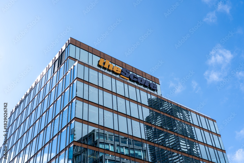 Fototapeta premium Toronto, Canada - September 21, 2025: theScore headquarters building in Toronto, Canada. theScore is a digital media, sports betting and technology company.