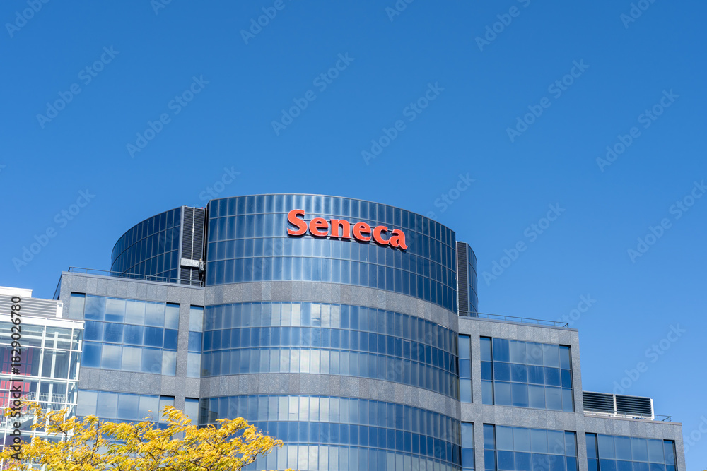 Fototapeta premium Markham, Ontario, Canada - September 21, 2025: Close up of Seneca sign on the building at Seneca College Markham campus. Seneca College of Applied Arts and Technology is a public college in Toronto.
