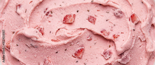Strawberry Ice Cream with Pieces of Fruit in Soft Pink Color  