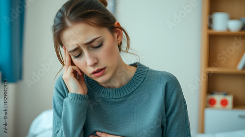 Young woman feeling nauseated