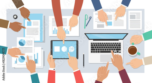 Collaborative office meeting with diverse team using technology and paper documents