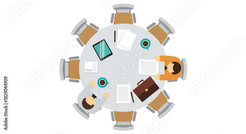 Collaborative meeting at round table with business professionals and office supplies