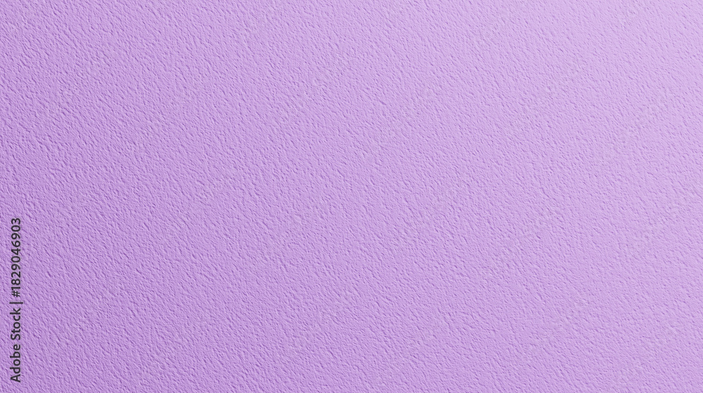 Fototapeta premium A soft lavender background featuring a smooth matte texture and uniform color.