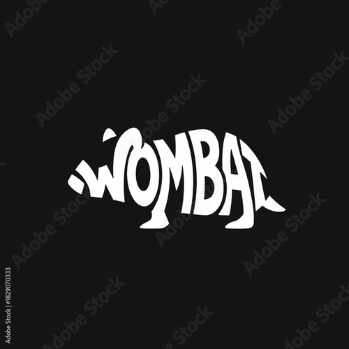 A creative logotype design featuring the word "WOMBAT" integrated into the silhouette of a wombat on a black background.
